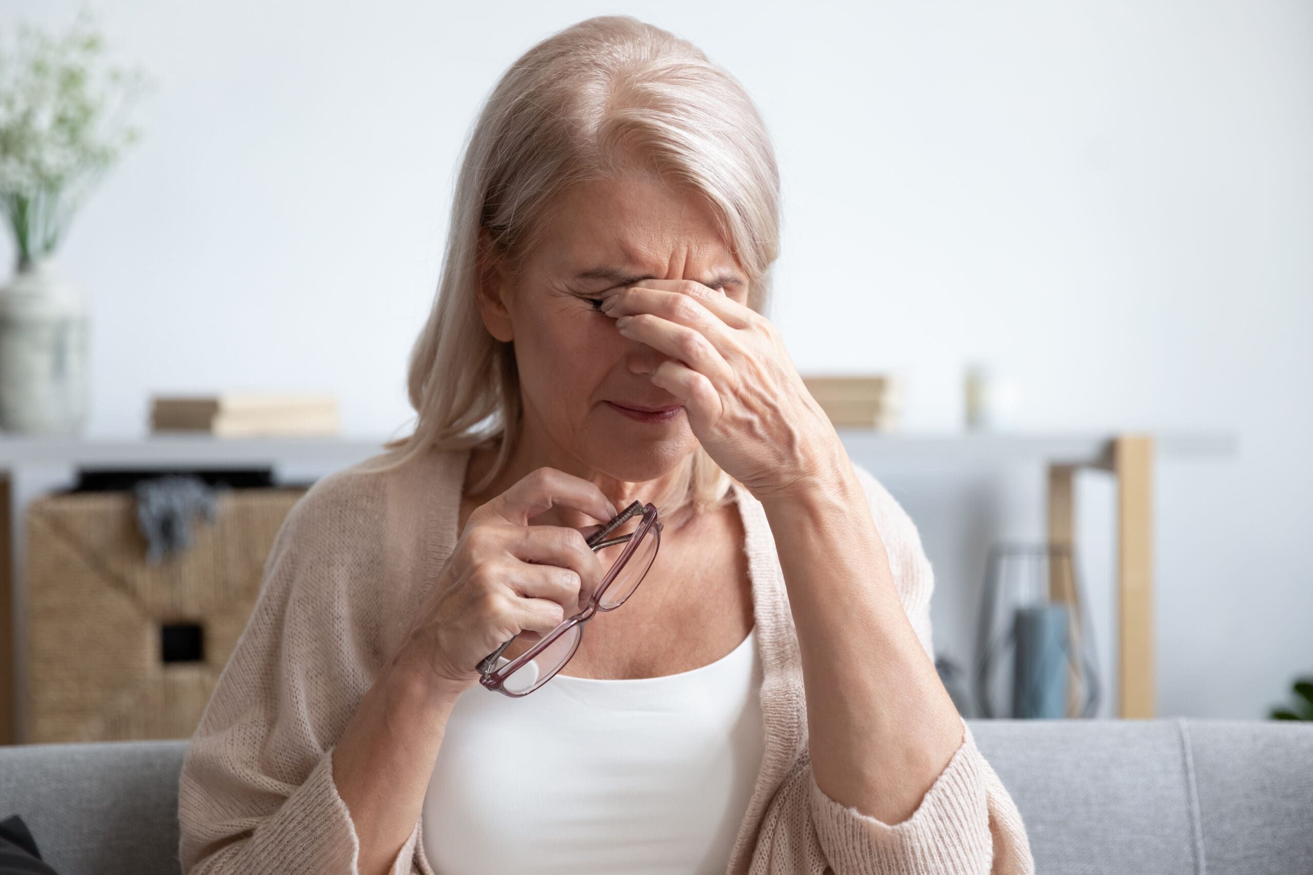 Head,Shot,Close,Up,Tired,Older,Lady,Taking,Off,Eyeglasses,